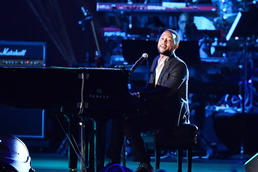 John Legend performs onstage during MusiCares. He is nominated for a Grammy in Best Traditional Pop Vocal Album and Best Rap/Sung Performance.