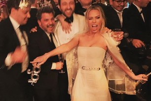 Sara Foster shows off her wedding reception dress after marrying Simon Tikhman on New Year's Eve.
