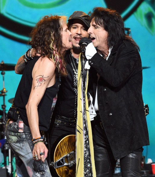 Steven Tyler performs on stage with Johnny Depp and Alice Cooper during MusiCares.