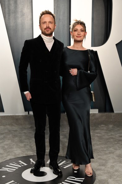 Aaron Paul and Lauren Parsekian look chic in black at the 2020 Vanity Fair Oscar Party.