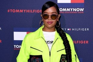 H.E.R attends the TommyNow show during London Fashion Week