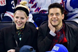 Lucy Boynton and Rami Malek at the Rangers game on Saturday.