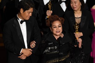 Miky Lee accepting the Best Picture award for "Parasite" during the Oscars on February 9