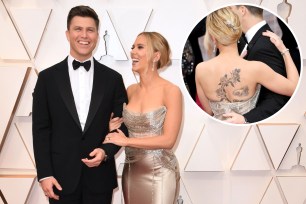 Scarlett Johansson shows off her back tattoos in a sexy Oscar de la Renta gown while posing with fiancé Colin Jost.