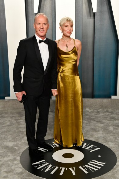 Michael Keaton (L) looks sharp at the 2020 Vanity Fair Oscar Party