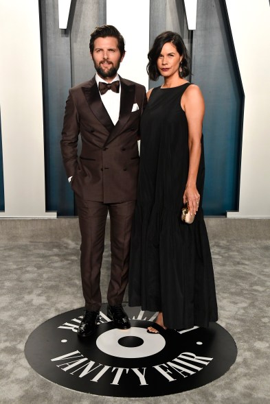 Adam Scott and Naomi Scott go monochromatic at the 2020 Vanity Fair Oscar Party