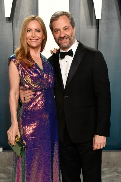 Leslie Mann (in State Property) and Judd Apatow pose at the 2020 Vanity Fair Oscar Party