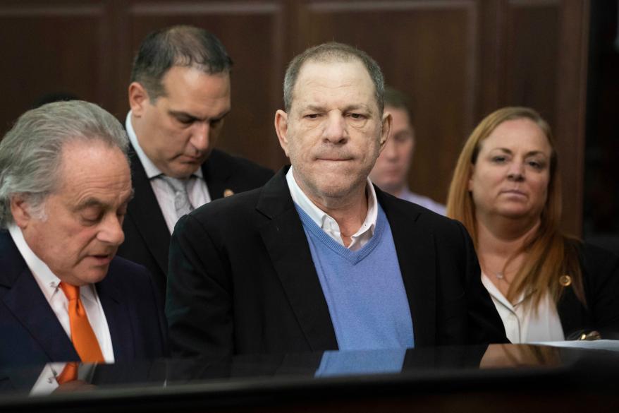 Harvey Weinstein, center, listens during a court proceeding in New York during his arraignment on rape and other charges. On Friday, June 1, 2018, a new rape allegation was made against Weinstein as part of a lawsuit alleging he had help covering up his misconduct with women.