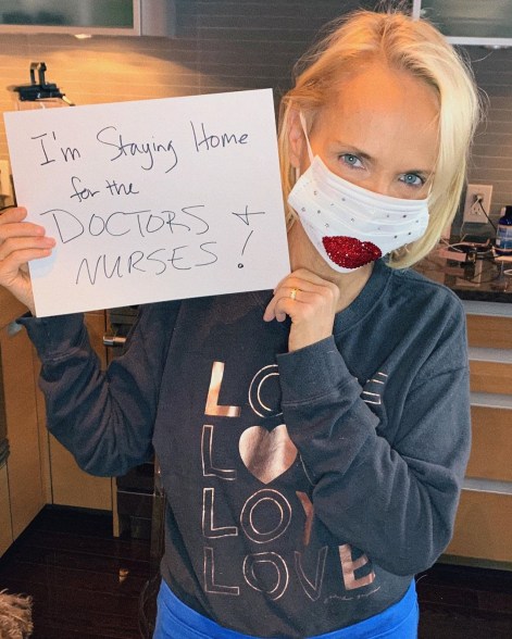 Kristin Chenoweth bedazzles her face mask with a pair of ruby red lips while staying home.