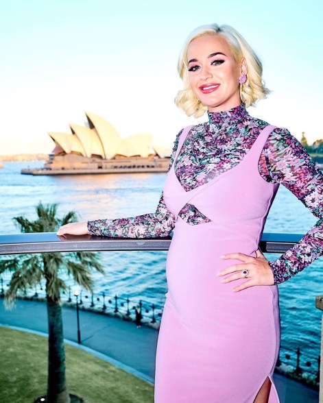 In Sydney on March 12, the mom-to-be looked radiant in a floral turtleneck and lavender dress from Bec + Bridge.