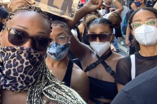 Cynthia Bailey takes her daughter Noelle and friend to a protest