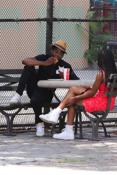 Chris Rock enjoys a slice of pizza from “Famous Ben’s Pizza of Soho” while out with daughter Zahra in NYC