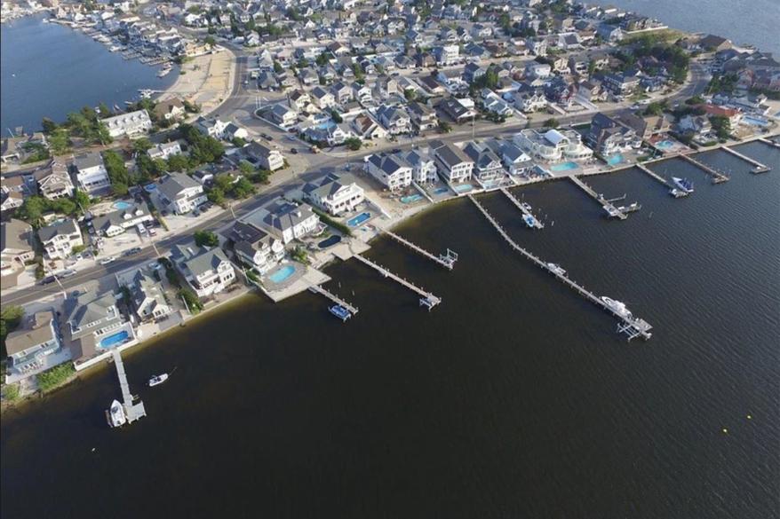 A boat dock that extends over 300-feet into Barnegat Bay, New Jersey.