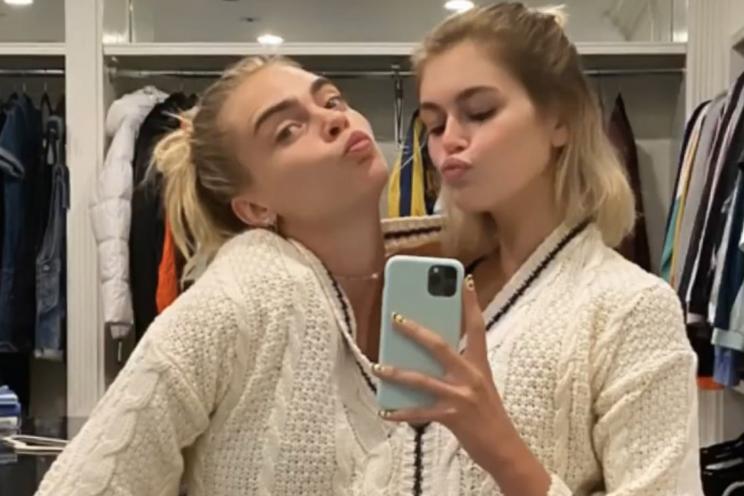 Cara Delevingne and Kaia Gerber in their cardigan from Taylor Swift