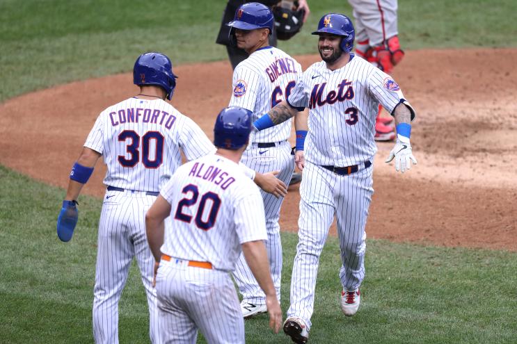 Tomás Nido #3 of the New York Mets celebrates with his teammates.