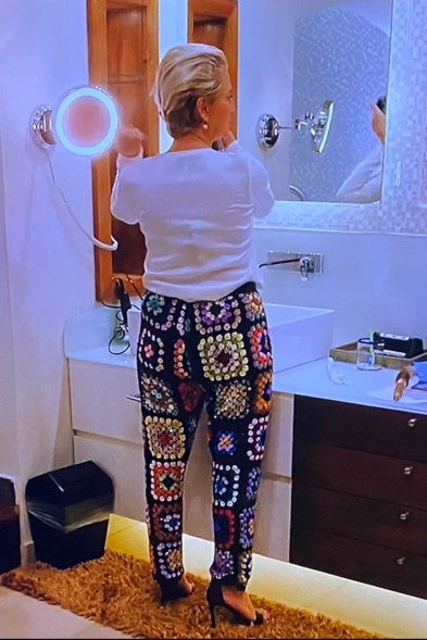 On the last night of the group's Mexico trip, Dorinda made a splash in Ashish sequin pants. Fans immediately remarked that the high-fashion granny square design resembles a knit blanket seen in "Roseanne."