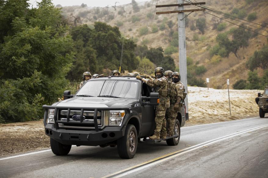 FBI units are seen leaving Jake Paul's home.