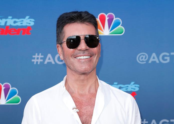 Simon Cowell back surgery