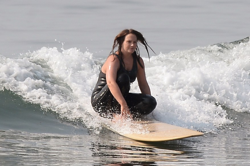 Leighton Meester shows off her impressive surfing skills in Malibu.