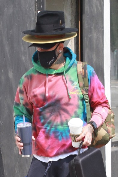 AJ McLean shows he can wear multiple hats, literally, as he leaves "DWTS" rehearsal in Los Angeles.