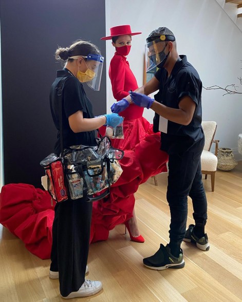 Coco Rocha gets runway ready for the Christian Siriano show.