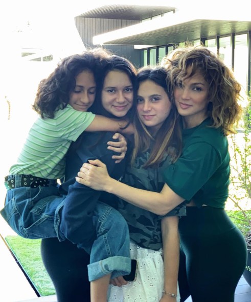 Jennifer Lopez (far right) poses with her daughter, Emme (from left), and her fiancé Alex Rodriguez's daughters Natasha and Ella.