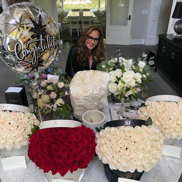 Leah Remini is surrounded by flowers after winning an Emmy for her show "Leah Remini: Scientology and the Aftermath."