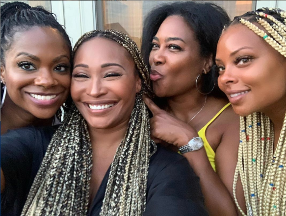 Bailey with bridesmaids Kandi Burruss, Kenya Moore and Eva Marcille