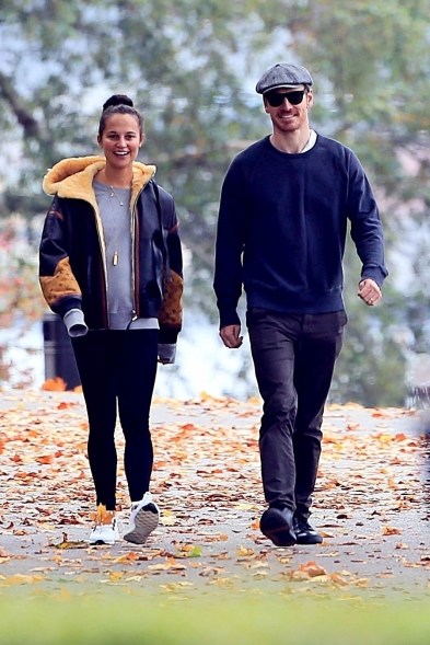 Alicia Vikander and her husband Michael Fassbender enjoy a peaceful walk in Stockholm to celebrate Alicia's 32nd birthday.