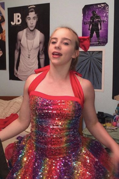 This throwback picture of a very young Billie in her childhood room filled with Justin Bieber posters has become iconic. The two even made the image — in which Eilish sports a rainbow sequin dress and tutu — the cover art for the Bieber "Bad Guy" remix.