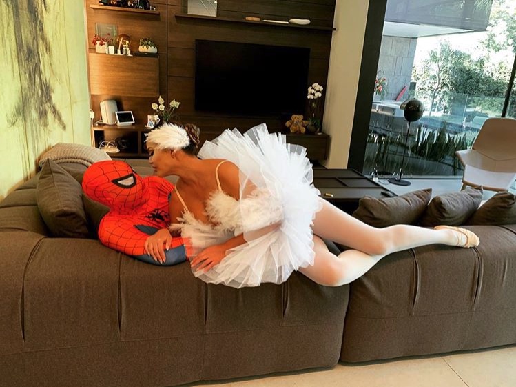 John Legend and Chrissy Teigen as Spiderman and Odette from "Swan Lake"
