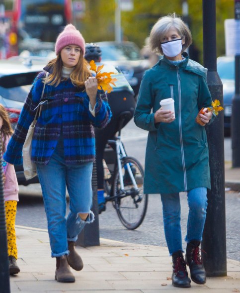 Claire Foy is ready for autumn in a plaid coat while out with her mother.