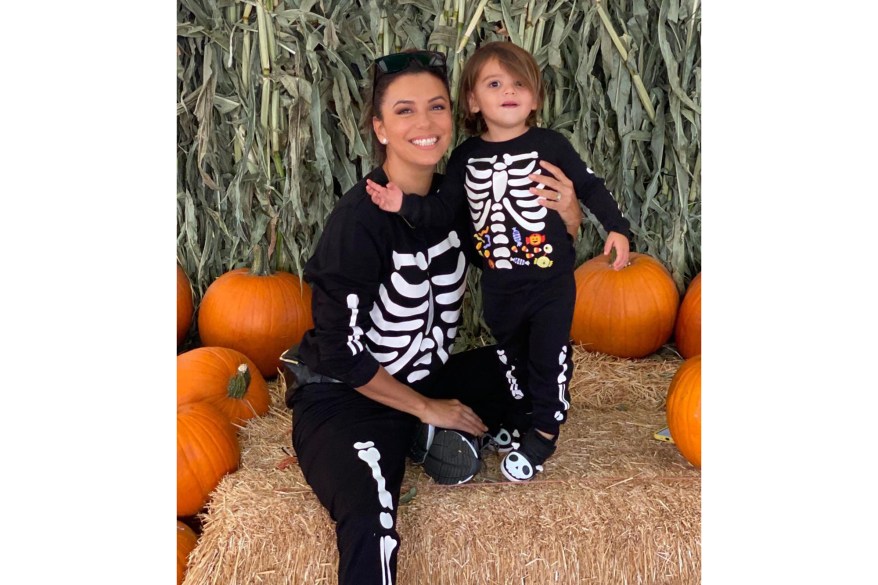 Eva Longoria and her son, Santiago, 2, dress as skeletons to visit a pumpkin patch.