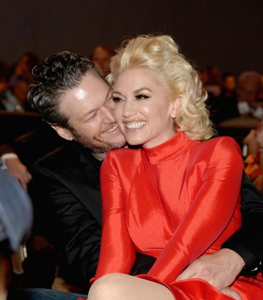 Gwen Stefani was beaming as she sat in Shelton's lap at a Grammy Gala in February of 2016.