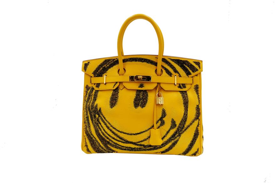 Designed on a vintage Hermès Birkin 35 in soleil yellow first produced in 2002, this artwork is inspired by the iconic smiley face, which has journeyed from the optimistic message of the 1960s to a commercialized logo, to an ironic fashion statement, to a symbol of rave culture seen on ecstasy pills and finally, to the ubiquitous emoji.