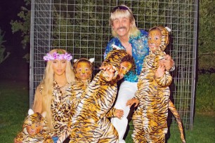 Kim Kardashian and Jonathan Cheban dressed up as "Tiger King" stars Carole Baskin and Joe Exotic for Halloween, with Kardashian's children donning tiger costumes.