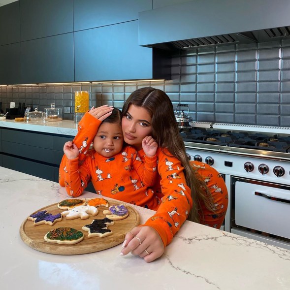 Kylie Jenner gets in the Halloween spirit while baking cookies with Stormi.