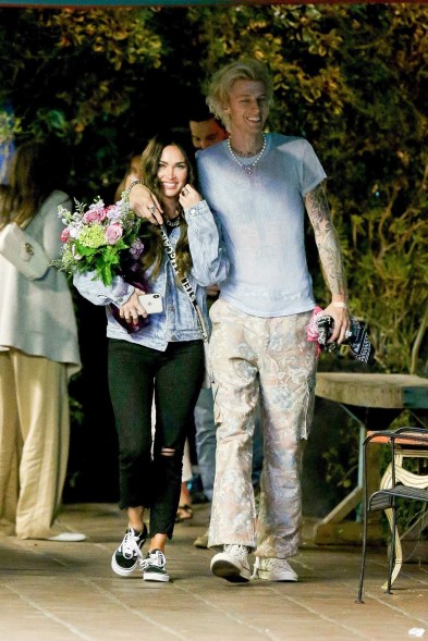 Machine Gun Kelly and Megan Fox take a romantic stroll through Hollywood, Calif.