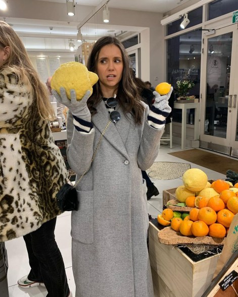 Nina Dobrev debates on whether size matters as she picks out lemons.