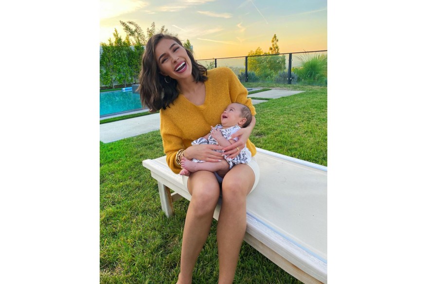 "Her smiles really are contagious," says Olivia Culpo, holding her newborn niece, Solei, in LA.