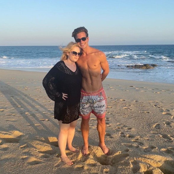 Rebel Wilson and her new boyfriend Jacob Busch hit the beach in Cabo San Lucas, Mexico.