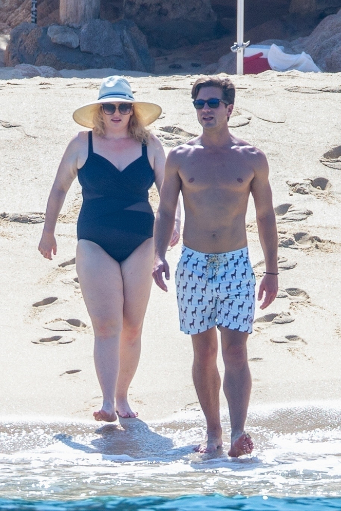 Rebel Wilson and boyfriend Jacob Busch hit the beach