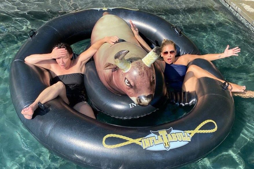 "It's harder than it looks," said Sarah Michelle Gellar (right), after riding an inflatable bull in the pool with Shannen Doherty.