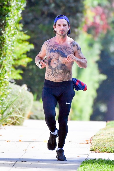 Shia LaBeouf still has a cast on his arm as he goes out for a run.