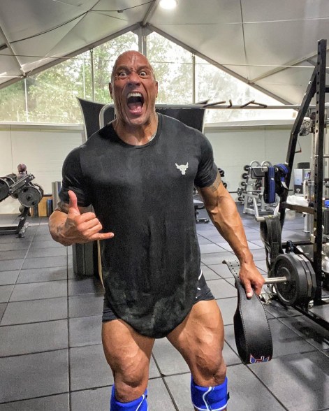 The Rock shows off his leg gains on yet another gym day.