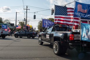 Trump supporters gather in a Long Island Rail Road parking lot