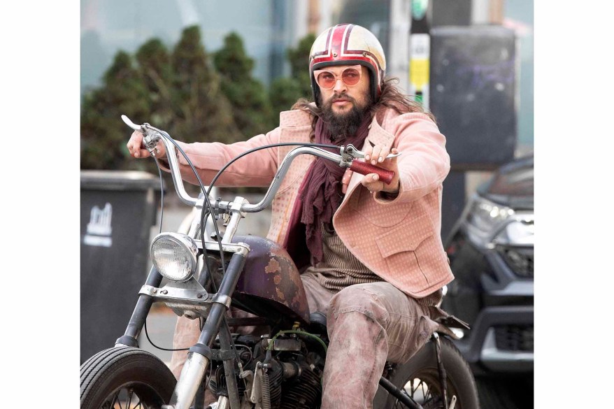 Jason Momoa steers his Harley-Davidson through Toronto.