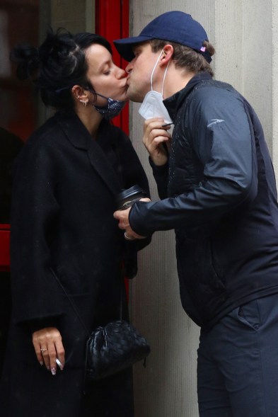 Newlyweds Lily Allen and David Harbour smooch on the street in New York City.