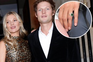 Kate Moss says she's not engaged to boyfriend Nikolai von Bismarck, despite wearing an emerald and diamond ring on an important finger.