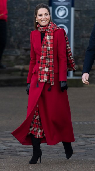 Kate Middleton dresses for the holidays as she thanks local volunteers at Windsor Castle.